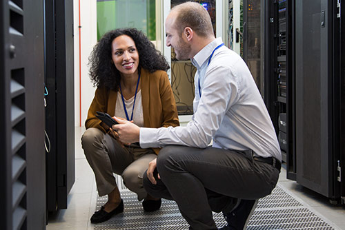 A woman presenting at a conference