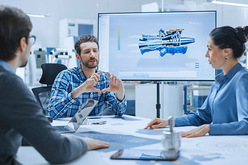 A woman presenting at a conference